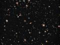 9 Aralık 2009 : Hubble En Derin Alan Kırmızı Ötesi : Gökadaların Şafağı